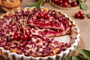 Clafoutis French sweet pie with cherries. Delicious summer homemade cake. 