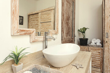 Mirror and sinks in modern bathroom