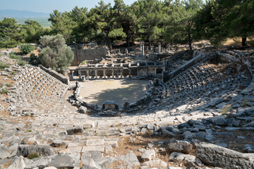 Fototapeta na wymiar Amphitheater of the ancient city of Priene. The ancient city of Priene is an Ionian city established in Aydın Söke, approximately 100 km from the ancient city of Ephesus. Turkey