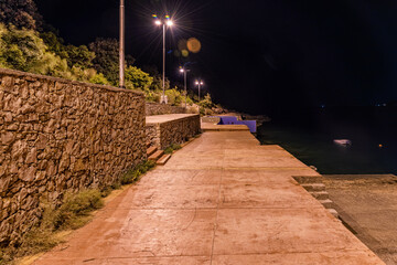 Utjeha Beach on the Adriatic coast in Montenegro by night.
