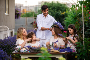 Family time in lavender garden, creative workshop outdoors