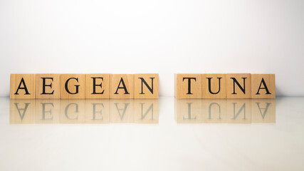 The phrase Aegean Danube was created from wooden letter cubes. Seafood and food.
