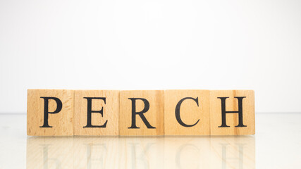 The name Perch was created from wooden letter cubes. Seafood and food.