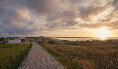 Wooden boardwalk next to the beach