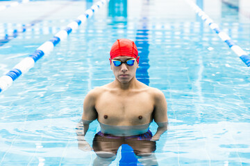 portrait of young latin man swimmer at the pool in Mexico Latin America