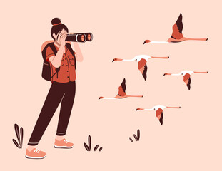 ornithologist with binoculars bird watching in nature
