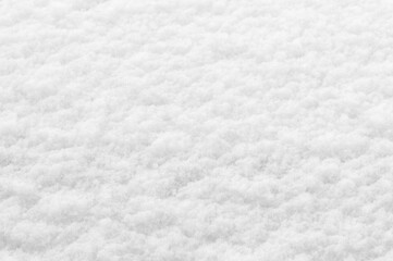 winter background: fresh clean even snow, large snowflakes