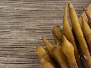 The fingerroot  on wood table close up image for food and medical concept