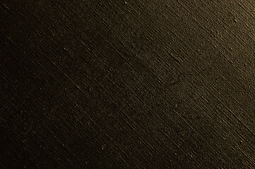dark creative background: black primed linen canvas, uneven lighting, color toning