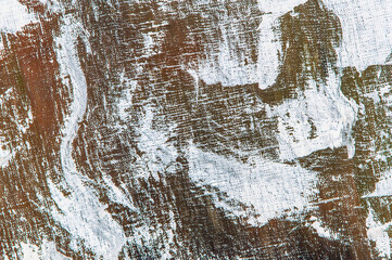 abstract colorful creative background - rough linen canvas unevenly covered with multi-colored primers, reflections of light. Toning, blur. Temporary object.