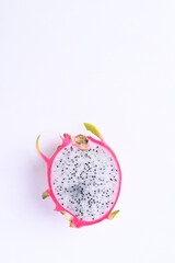 Half dragon fruit or pitaya on white background with copy space, Tropical fruit