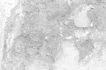 Old cement wall painted white, peeling paint texture and background