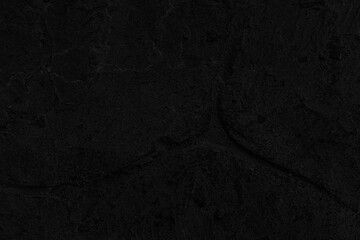 Dark grey black slate background or texture. Black granite slabs background