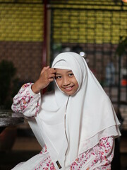 Southeast Asian muslim girl give her nice smile