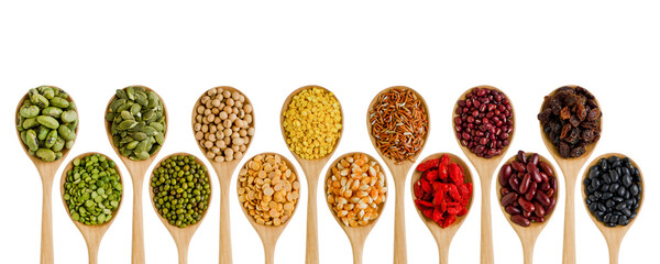 Collection of dry organic green, yellow, brown, red, and dark brown cereal and grain seed in wooden spoon on white background. Concept of healthy food ingredient or agricultural product concept