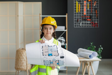 Cute little architect with house plan in office