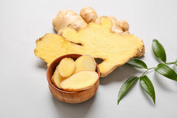 Composition with fresh ginger on grey background