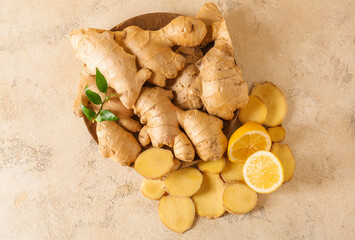 Composition with fresh ginger and lemon on light background - Powered by Adobe