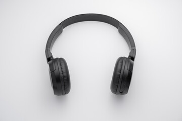 Black headphones on a white background