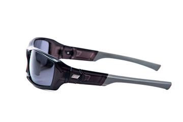 Fototapeta premium Side view. Fashion sunglasses black frames on white background.