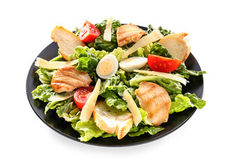 Plate with tasty Caesar salad on white background