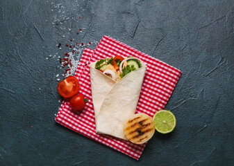 Tasty doner kebab on dark background