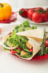 Plate with tasty doner kebab on light background, closeup