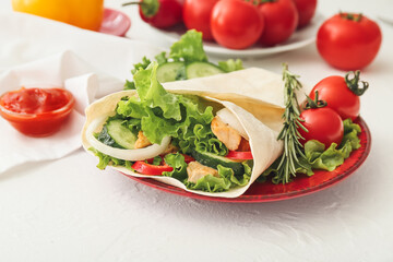 Plate with tasty doner kebab and sauce on light background, closeup