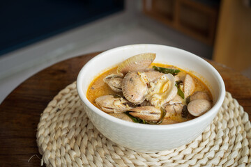 Chilli Butter Cream Clam served in a bowl on a table.
