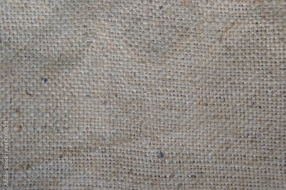 Poster the texture of coarse natural burlap. a fabric with a clear interweaving of threads. a rustic object