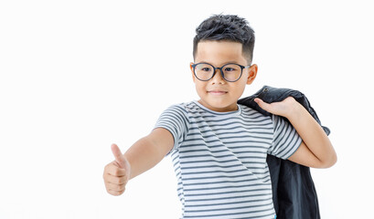 Lovely cutout portrait of smart healthy Asian boy wearing glasses and horizontal striped shirt holding black jacket on shoulder and thumb up with smile to great thing he satisfied and agreed