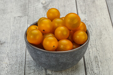 Fresh yellow cherry tomato heap