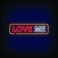 Love Me Neon Signboard On Brick Wall