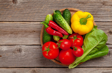 Various fresh vegetables and cutting board