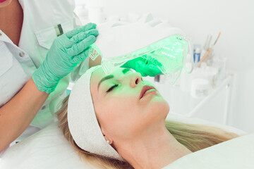 Led light mask for face skin treatment, frofessional cosmetology procedure