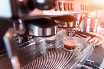 Espresso shot pouring out.