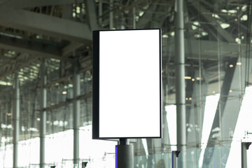 Blank screen advertise mockup in the airport terminal. Display for billboard ad in the building....