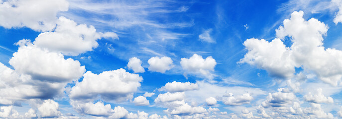 White fluffy clouds clear blue sky background panorama, cumulus cloud texture, cloudy azure skies...