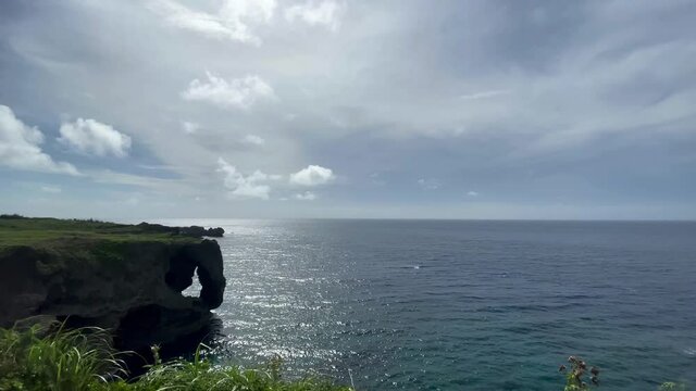 OKINAWA, JAPAN - JUNE 2021 : Cape Manzamo located near Onna son village in the Kunigami District. Wide view, real time shot in daytime.