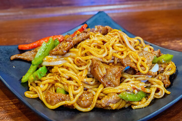 Close up shot of fried beef noodle