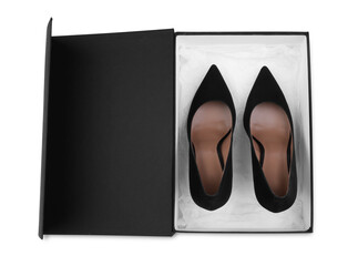 Pair of stylish leather shoes in black box on white background, top view