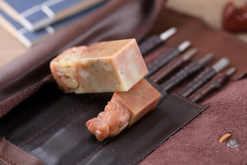 Blank seal stones on various carving knives