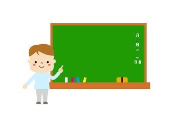 黒板と黒板を指さしている男の子