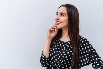 Portrait of pretty young smilling woman. Elegant cheerful female model.