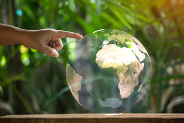 Earth globe in  hands. World environment day