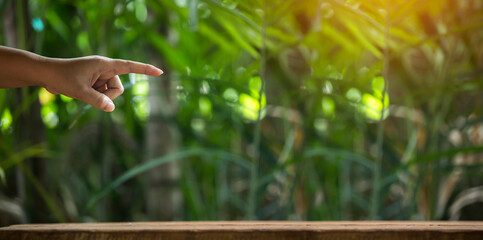 Technology, hand holding with environment Icons over the Network connection on green background