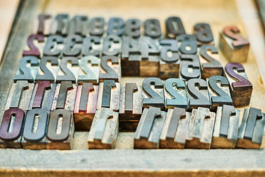 Shabby metal letterpress numbers on tray