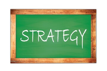 Fototapeta premium STRATEGY text written on green school board.