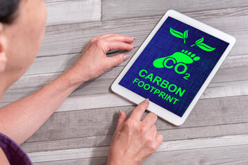 Carbon footprint concept on a tablet