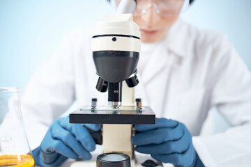 Woman in white coat science research experiment professional